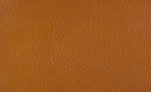 Close-up brown leather texture for KKCOCO Studio VIP payment channel