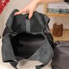 Black Leather Shoulder Bag with Adjustable Strap and Make-up Bag