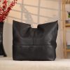 Black Leather Shoulder Bag with Adjustable Strap and Make-up Bag