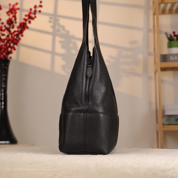 Black Leather Shoulder Bag with Adjustable Strap and Make-up Bag