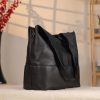Black Leather Shoulder Bag with Adjustable Strap and Make-up Bag