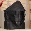 Black Leather Shoulder Bag with Adjustable Strap and Make-up Bag