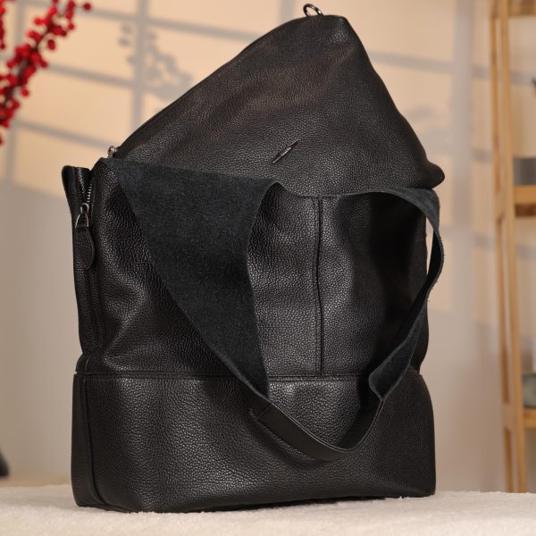 Black Leather Shoulder Bag with Adjustable Strap and Make-up Bag